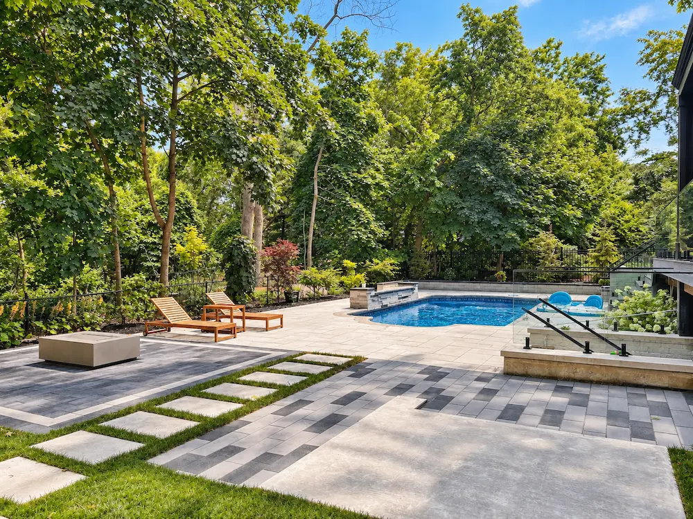 Distinct outdoor rooms defined by paving pattern and texture