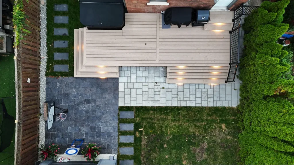 Kirkendall, Hamilton backyard with a composite deck, step lights and a paver patio